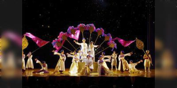 Cher on stage performing in 2025